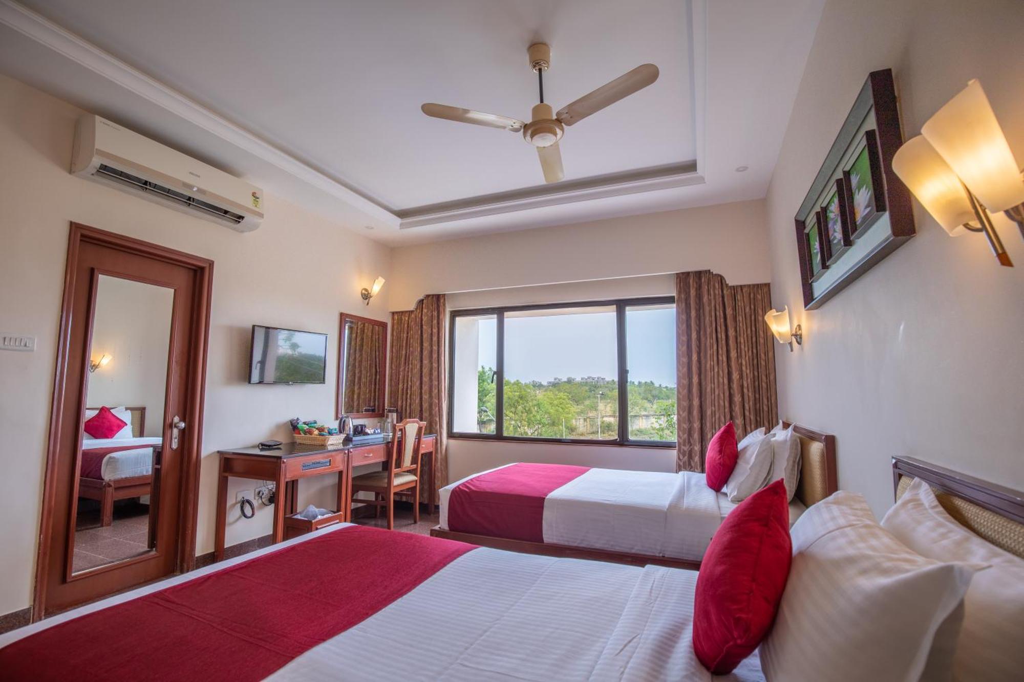 Hotel Jenney Residencia Coimbatore Habitación foto